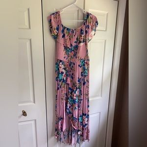 Size medium. Can be worn off shoulder. High/low midi dress.